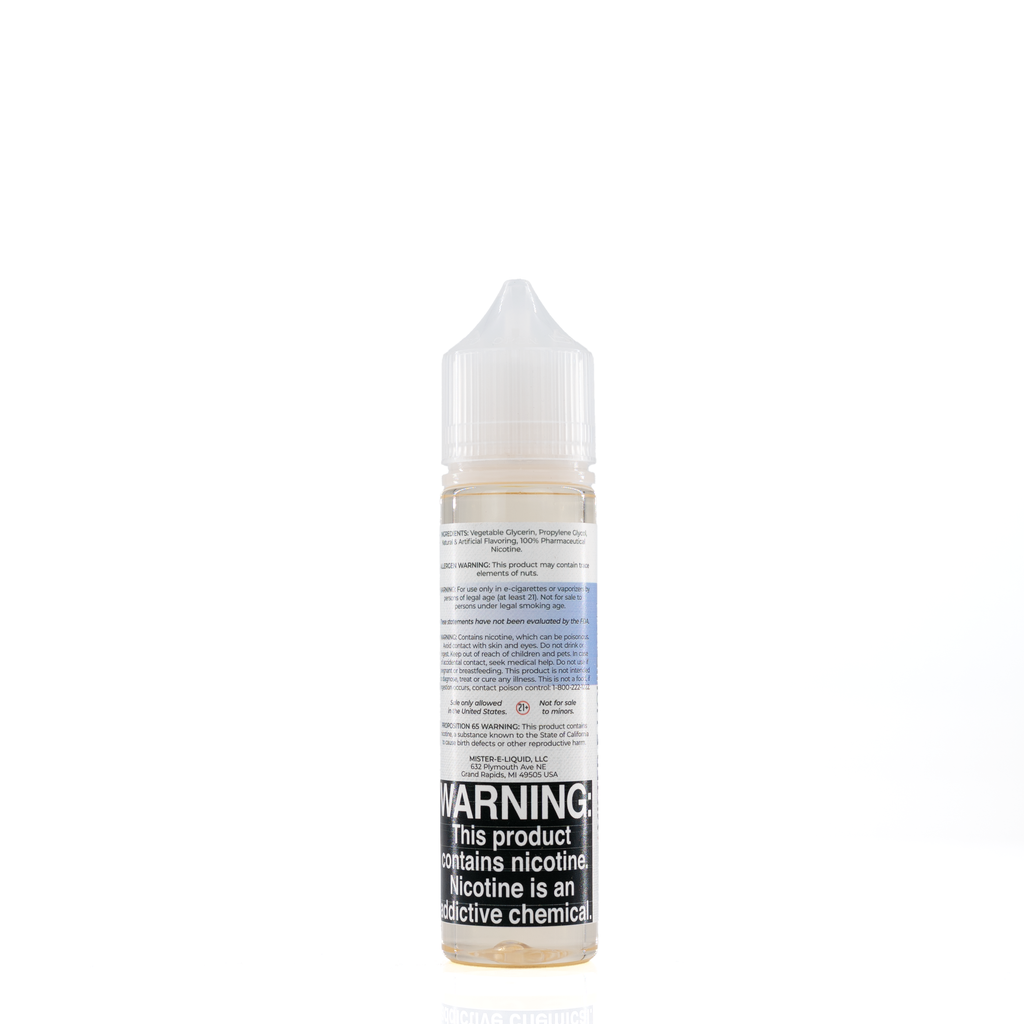 A mister e-liquid bottle is placed on a reflective surface and against a white background. The bottle outlines the ingredients and the warning label.