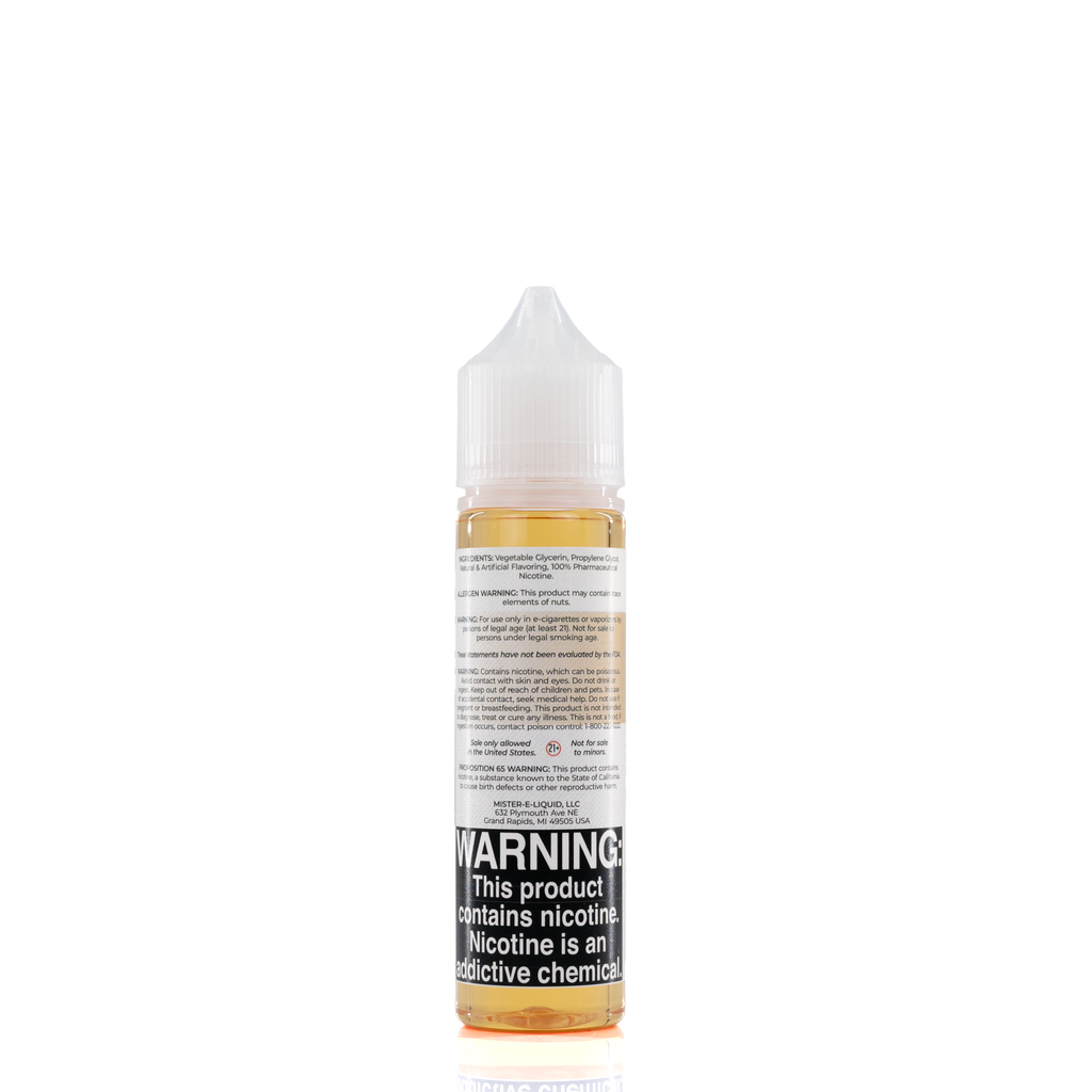 A mister e-liquid bottle is placed on a reflective surface and against a white background. The bottle outlines the ingredients and the warning label.
